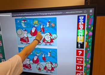 Powiększ zdjęcie: Gra w odnajdywanie różnic między Mikołajami na platformie Digipuzzle.